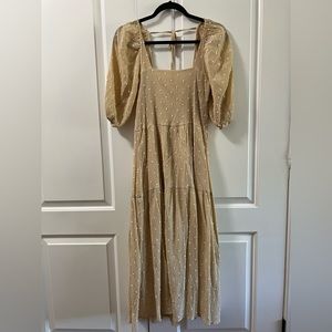 Semi-open back dress with white polka dots, mid length, size small.